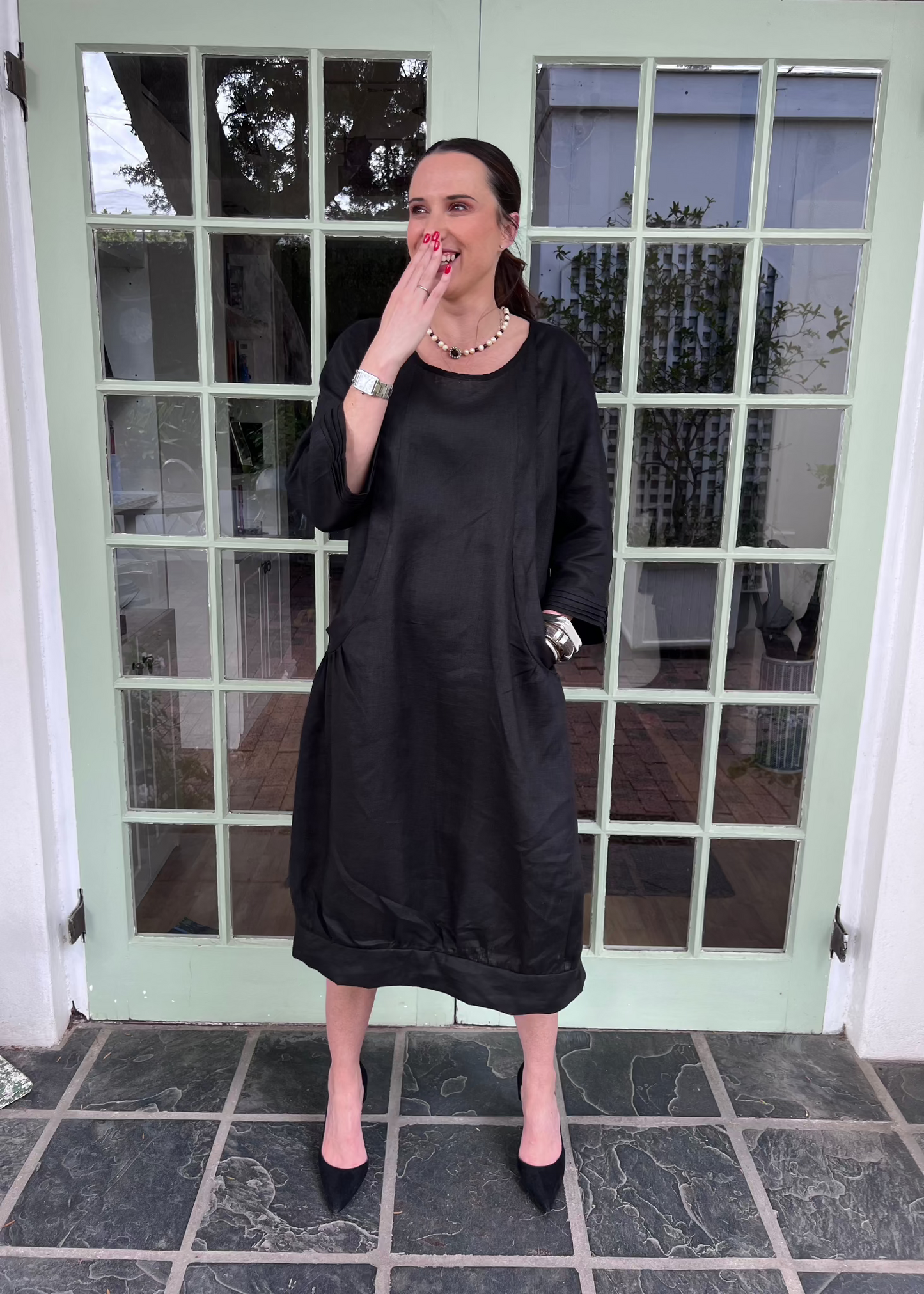 Crafted from breathable linen for all-season comfort, this ingeniously simple dress lives up to its name with fuss-free sophistication. The pull-on design eliminates buttons and zippers for easy dressing, while strategically placed pockets offer both utility and perfect proportions.