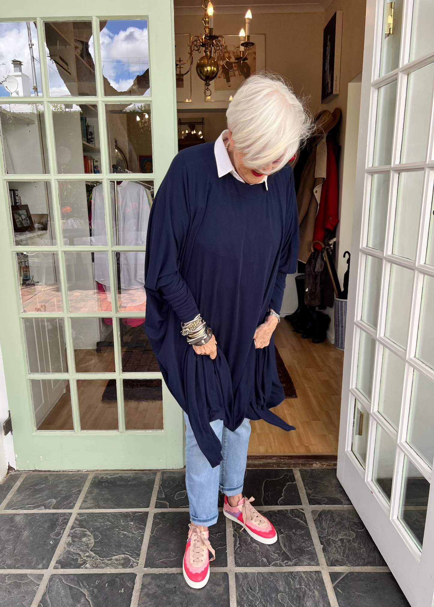 If there's one sentence I really love it's "One size fits all". And that's just what this is. A cosy, comfy throw-on top that works for all sizes. Rayon with a bit of Poly to keep its shape. Tight stretchy cuffs so you can push up and they stay up. Can be worn with a shirt underneath, comes with a scarf.