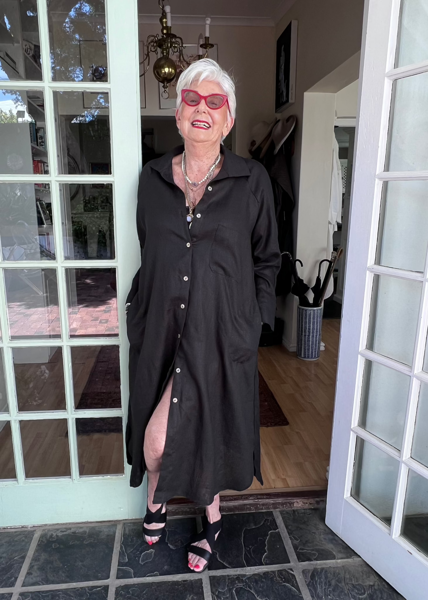 Crafted from pure 100% linen, this effortlessly versatile shirt dress transitions seamlessly through seasons and styles. Wear it solo with sandals in summer, layer it over a polo and tights in winter, or unbutton it completely to create a flowy lightweight coat.