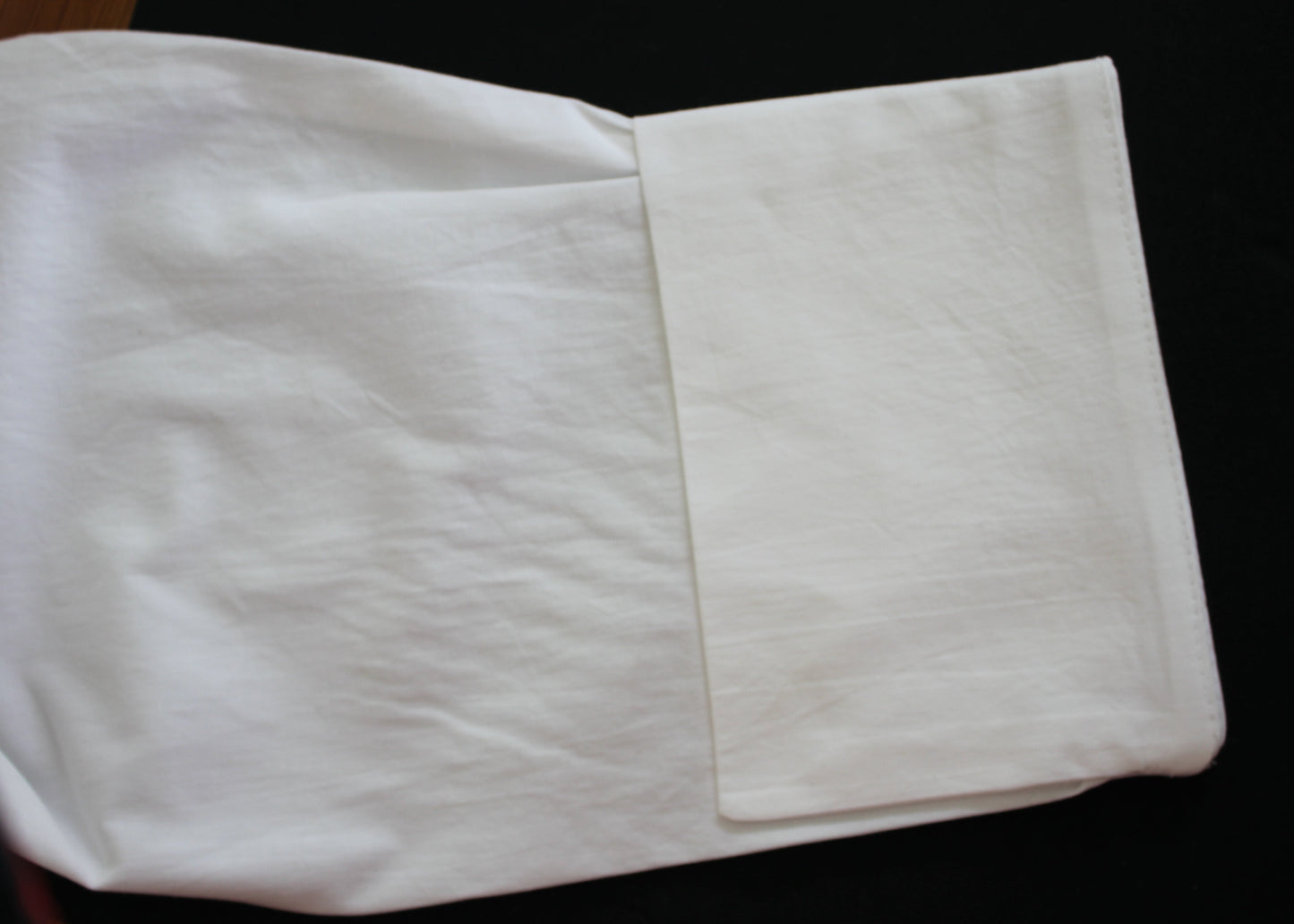 A Japanese-inspired cotton shirt that combines crisp structure with convertible styling.