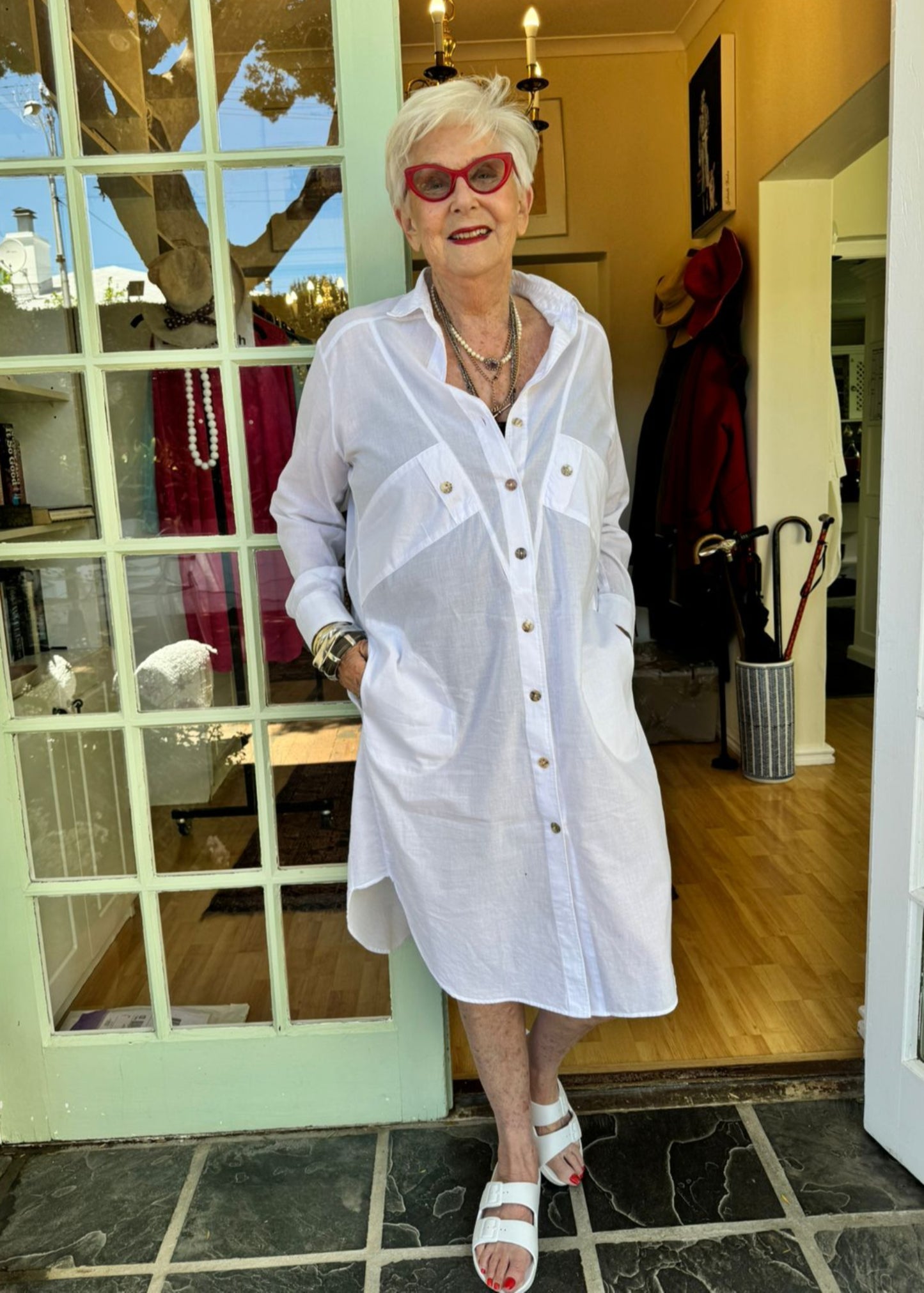 Crafted from delicate fine voile that feels softer than soft against your skin, this dreamy shirt dress is your warm-weather wardrobe hero. Designed for effortless styling, it transitions seamlessly from beach cover-up (just slip it over your swimsuit) to chic urban outfit (layer it over black tights or jeans). 